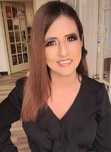 portrait of Monserrat Mendoza, co-founder of Viva Resource, a confident woman in a casual but professional outfit standing in front of a neutral background